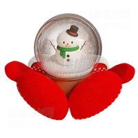 针织红色手套拿着带有雪人的纪念品雪球 knitted red mittens hold a souvenir snow globe with a snowman